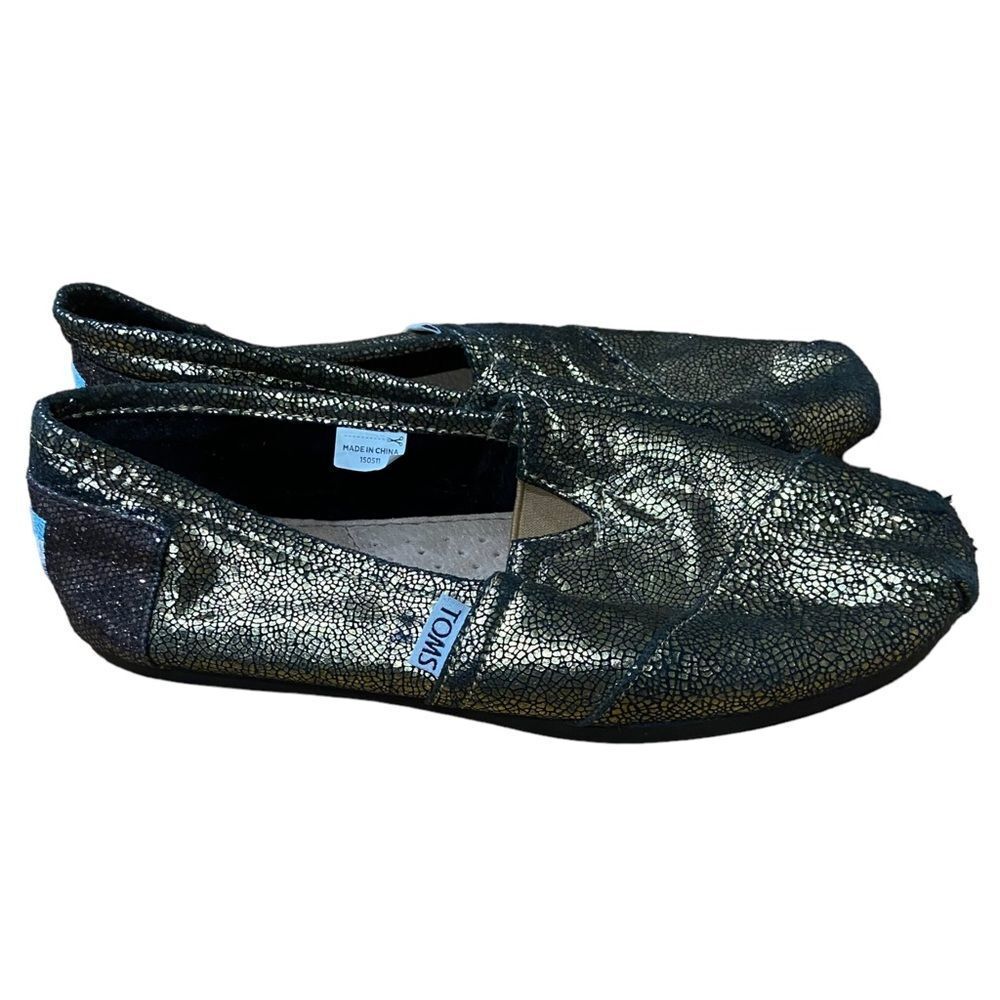 Toms Black & Gold Slide On Loafers